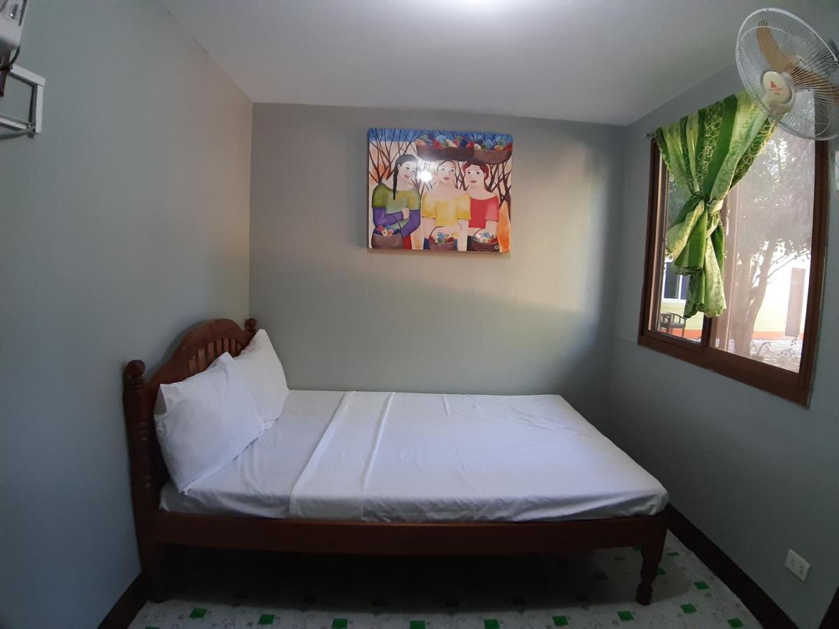 Oyo 671 Natua'S Cabin Hotel Puerto Princesa Екстериор снимка
